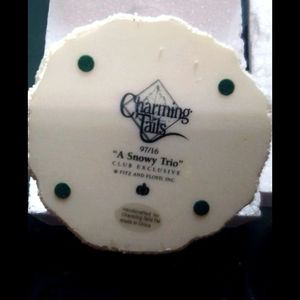 Charming tails A Snowy Trio